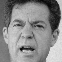 In this photo taken Sept. 6, 2014, Kansas Gov. Sam Brownback speaks in Hutchinson, Kansas. The writing is on the wall for gay marriage bans in Kansas, Montana and South Carolina after federal appeals courts that oversee those states have made clear that keeping gay and lesbian couples from marrying is unconstitutional. But officials in the three states are refusing to allow same-sex couples to obtain marriage licenses without a court order directing them to do so. It could be another month or more before the matter is settled. In a political campaign debate Monday, Brownback vowed to defend his state’s constitutional amendment defining marriage as between a man and a woman. A federal court hearing is scheduled for Friday.(AP Photo/Charlie Riedel)