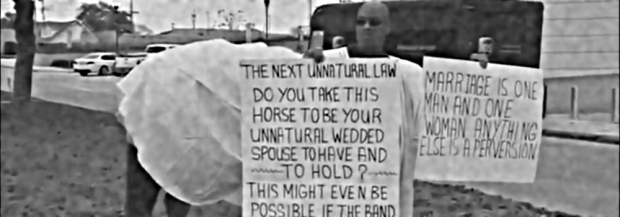 Not a mythical centaur, but, rather, a determined preacher and his horse.  Pastor Edward James protests marriage equality in Mississippi, 12 December 2014, comparing homosexuals to non-human animals outside a federal courthouse in Jackson.  (Image: WAPT News)