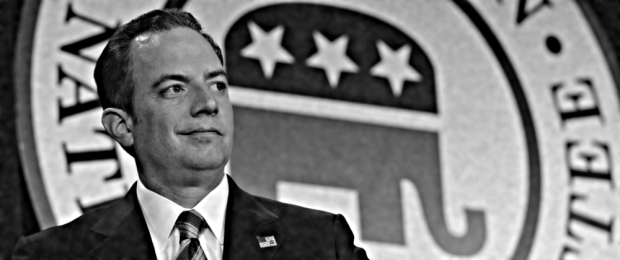 Republican National Committee (RNC) Chairman Reince Priebus stands on stage at the Republican National Committee winter meeting in Washington, Friday, Jan. 24, 2014.  (AP Photo/Susan Walsh)
