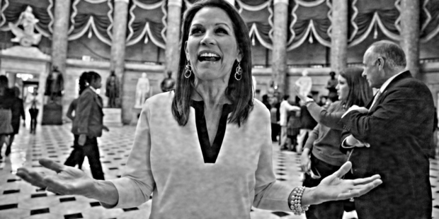 Rep. Michelle Bachmann (R-MN), left, and Rep. Steve King (R-IA), right, speak with reporters at the Capiol, 11 December 2014. (AP Photo/J. Scott Applewhite)